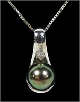 14K White gold black pearl and diamond pendant