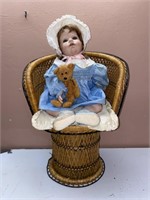 24IN WICKER CHAIR & 18IN HAND MADE CERAMIC DOLL