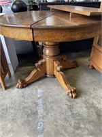 Antique oak claw foot table with lions head