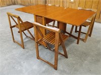 PINE DROP LEAF TABLE WITH HIDDEN FOLDING CHAIRS