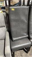 Two gray bonded leather chairs