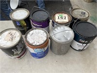 7 Cans of Paint in Various Colors