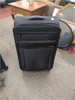 Lucas Luggage- large, 4- wheeled, looks like new