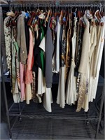 Rack of designer clothes: Gucci, Valentino,