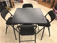 Standard folding card table with four folding