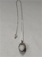 Sterling silver necklace with reversible pendant