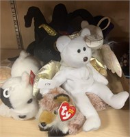 Group of beanie babies and stuffed animals