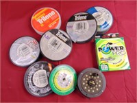 lot of fishing line and fly reel
