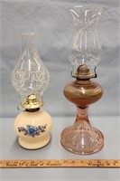 (2) Oil Lamps- One w Floral Design and Design on
