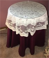 Little 3 legged table with lace table cloth