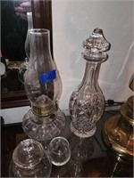 Oil lamp and other clear glassware in picture