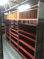 3 Sections Of Red Continious Shelving