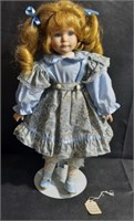 Strawberry Blonde Porcelain Doll with Blue