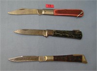 Group of oversized easy open pocket knives