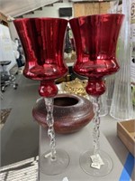 Pair of red glass candleholders
