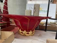 Large red bowl on pedestal