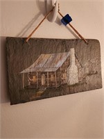 Stone look wall hanging of Cabin