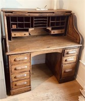 Antique oak roll top desk , 7 bottom drawers with