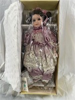 A Connoisseur Collection Porcelain Doll