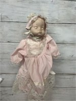 Baby doll with stand