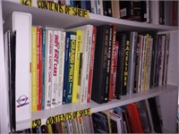 Shelf of Books to include books about Racing