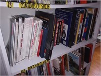 Shelf of Books to include books about Racing,