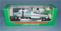 Vintage miniature Hess race car and transport truc