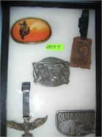 Collection of vintage watch fobs and belt buckles