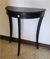 Black Half Table 25in Tall 24 in Wide and 12 in D