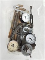 Container of gauges and other items