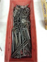 Red container of larger hex keys