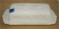 MILK GLASS COVERED BUTTER DISH-GRAPEVINE PATTERN