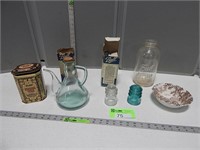 Zinc lids, glass pitcher, tea tin, glass insulator