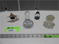 Paperweights, flower frogs and a perfume bottle