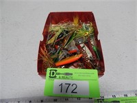 Box of fishing tackle, most of the box is spoons