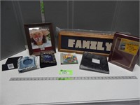 Box with many picture frames and photo albums