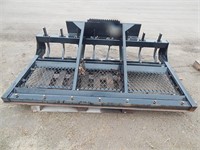 Dirt/sand/gravel lever with skid steer attachment
