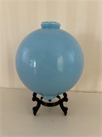 Blue glass lightning rod ball and stand.