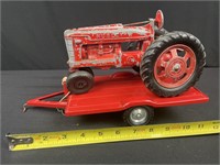 Hubley tractor on metal trailer die cast 1/16