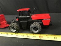 Case IH battery operated tractor with wagon