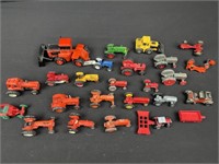 Several small scale tractors all different makes
