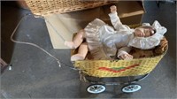 OLD DOLL CARRIAGE WITH PORCELAIN DOLL