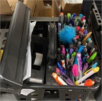 Tote of office supplies, and pens
