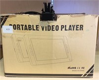 Portable video player with two screens, and two