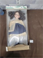 Vintage porcelain doll still in package