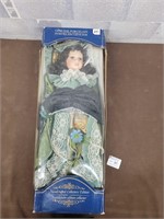 Vintage porcelain doll still in package