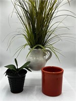 2 faux plants and planters