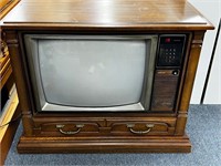 Vintage colortrak television powers on