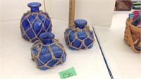 Blue jars tied with rope