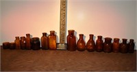 16 early brown glass bottles, tallest 4"h; as is